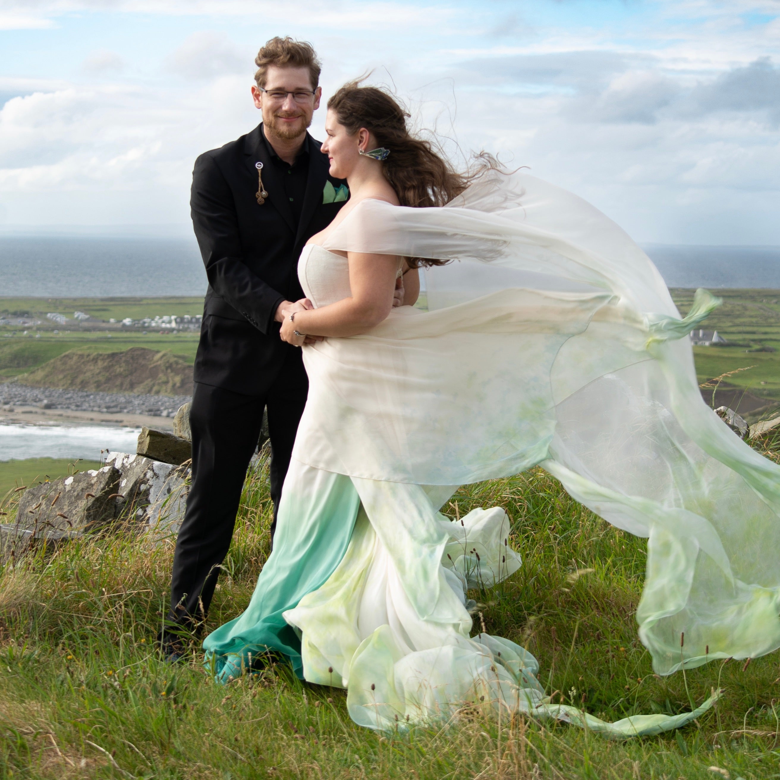 Real bride in Ireland wearing a custom larimeloom color wedding dress in ivory and green