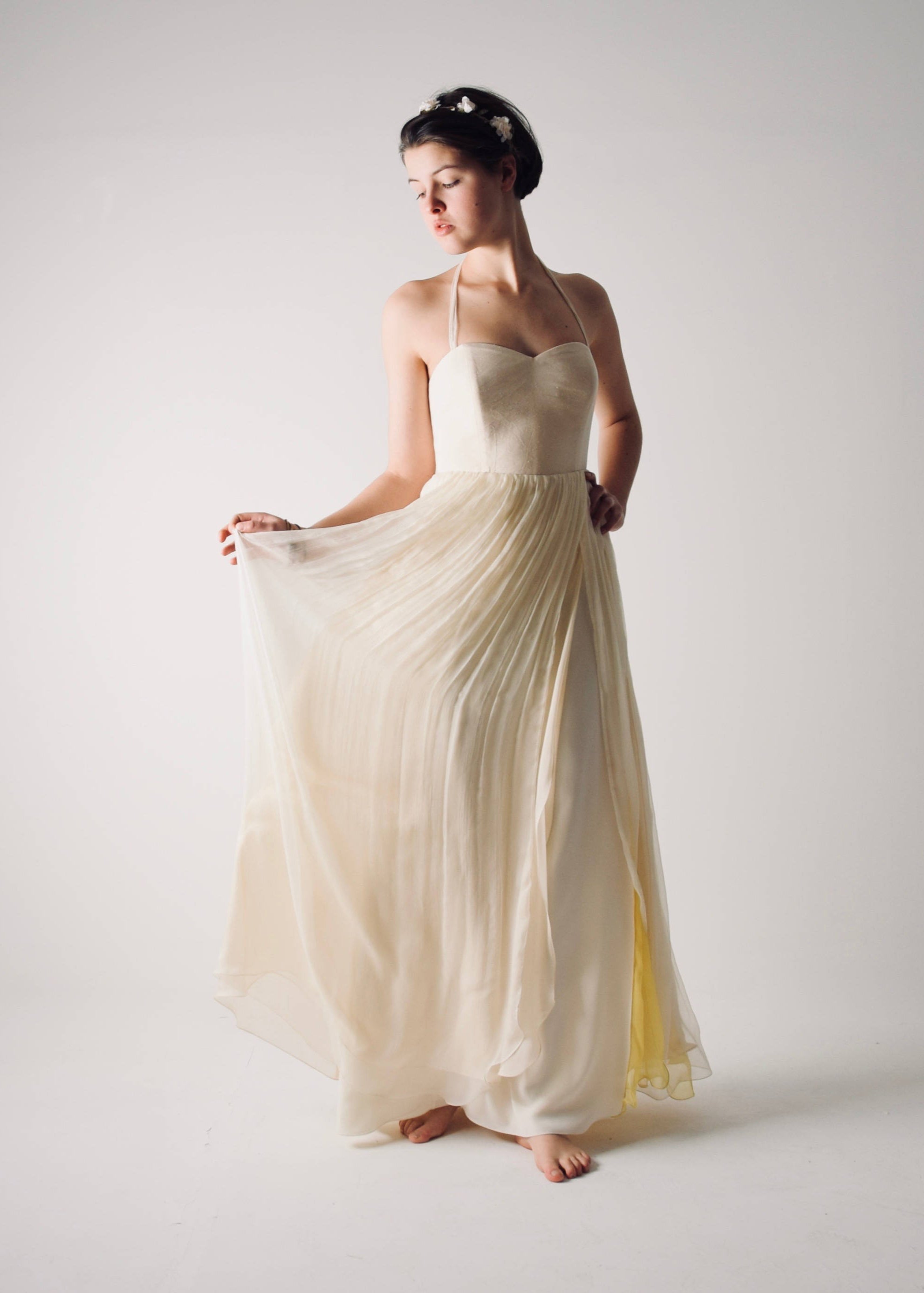 Narcissus open back summer wedding dress with yellow color accents in movement