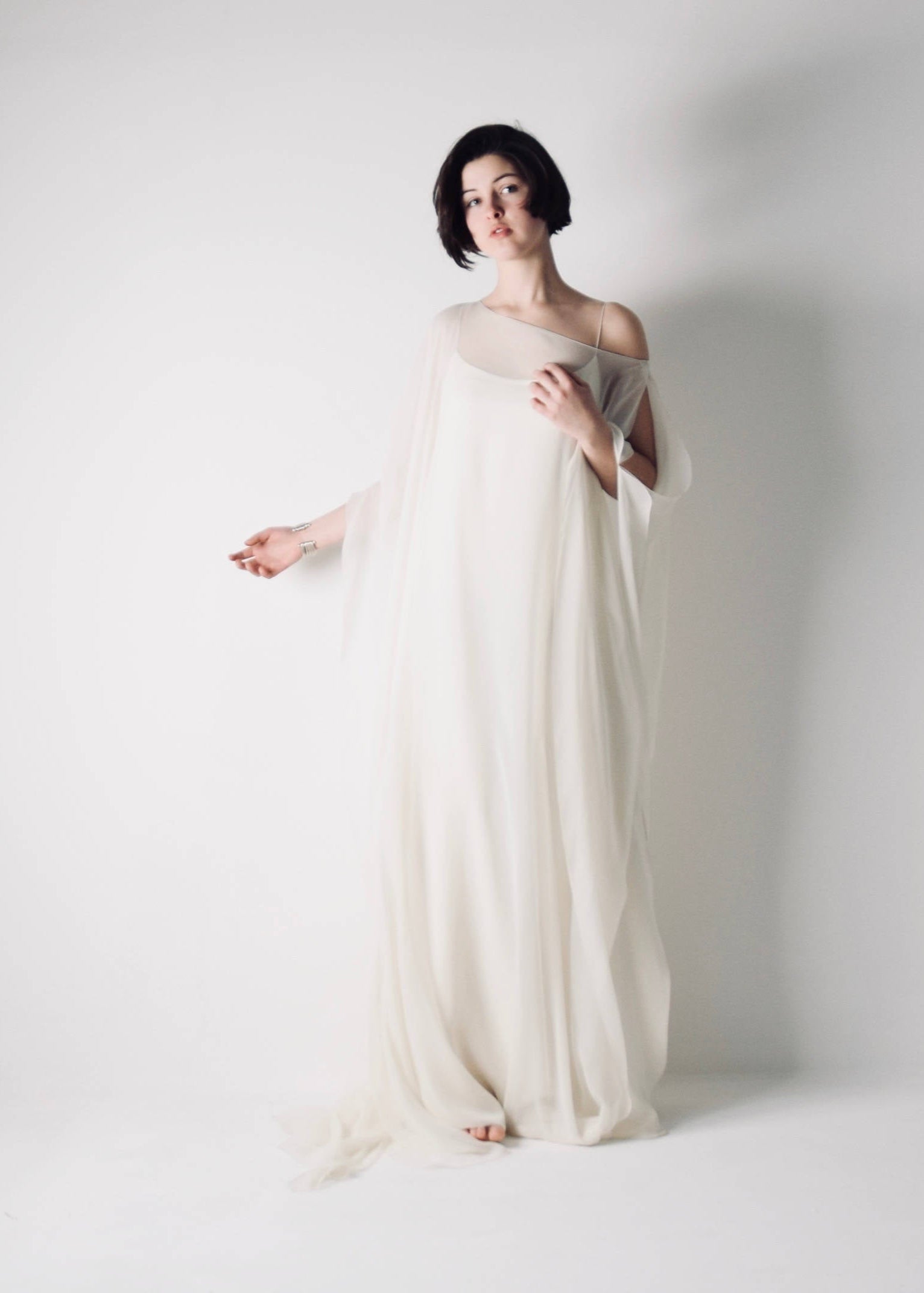 Flowy goddess style Ivory silk Kaftan wedding dress with a slip dress and a thin sash