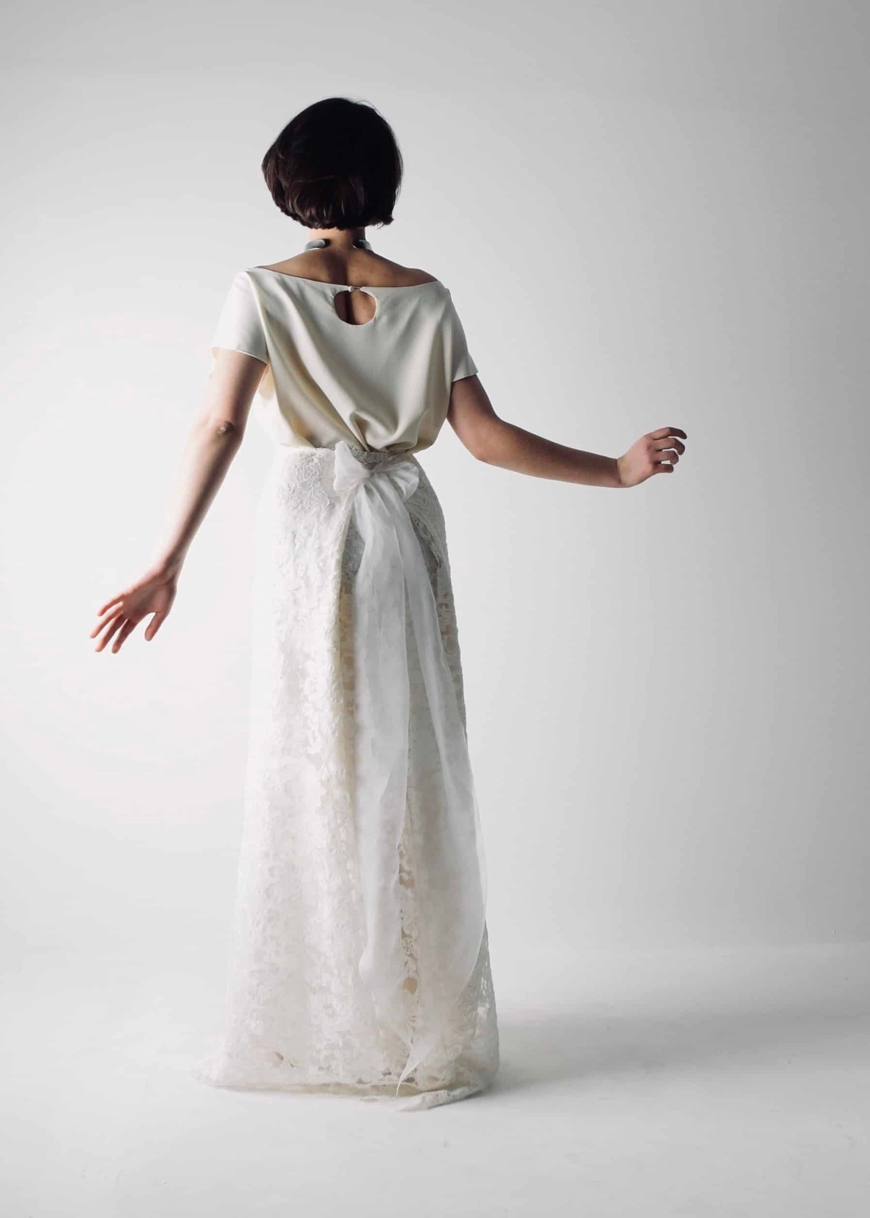 Romantic lace wedding skirt, with an A-line cut, paired with a separate soft silk bridal blouse, for a simple wedding dress look