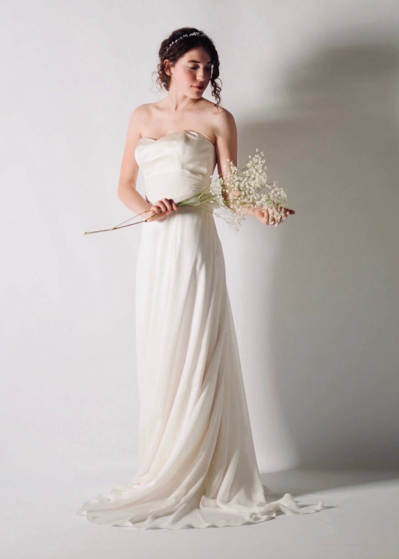 CALLA, A-Line Silk Satin Bridal Skirt with a Short Train, perfect for modern weddings. side view