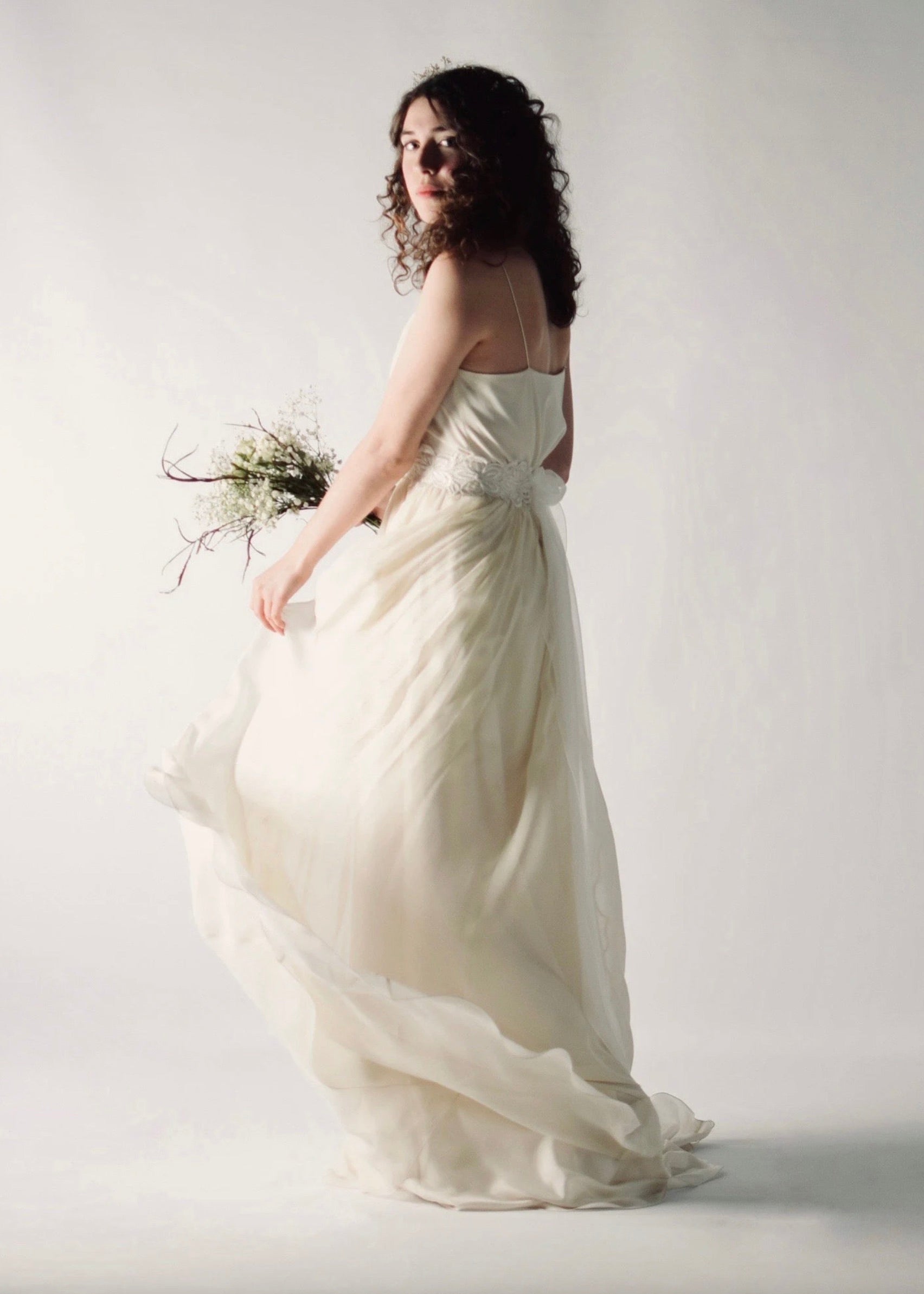 Unique bohemian wedding skirt made of three light, flowing layers of soft silk chiffon, offering a romantic and airy look