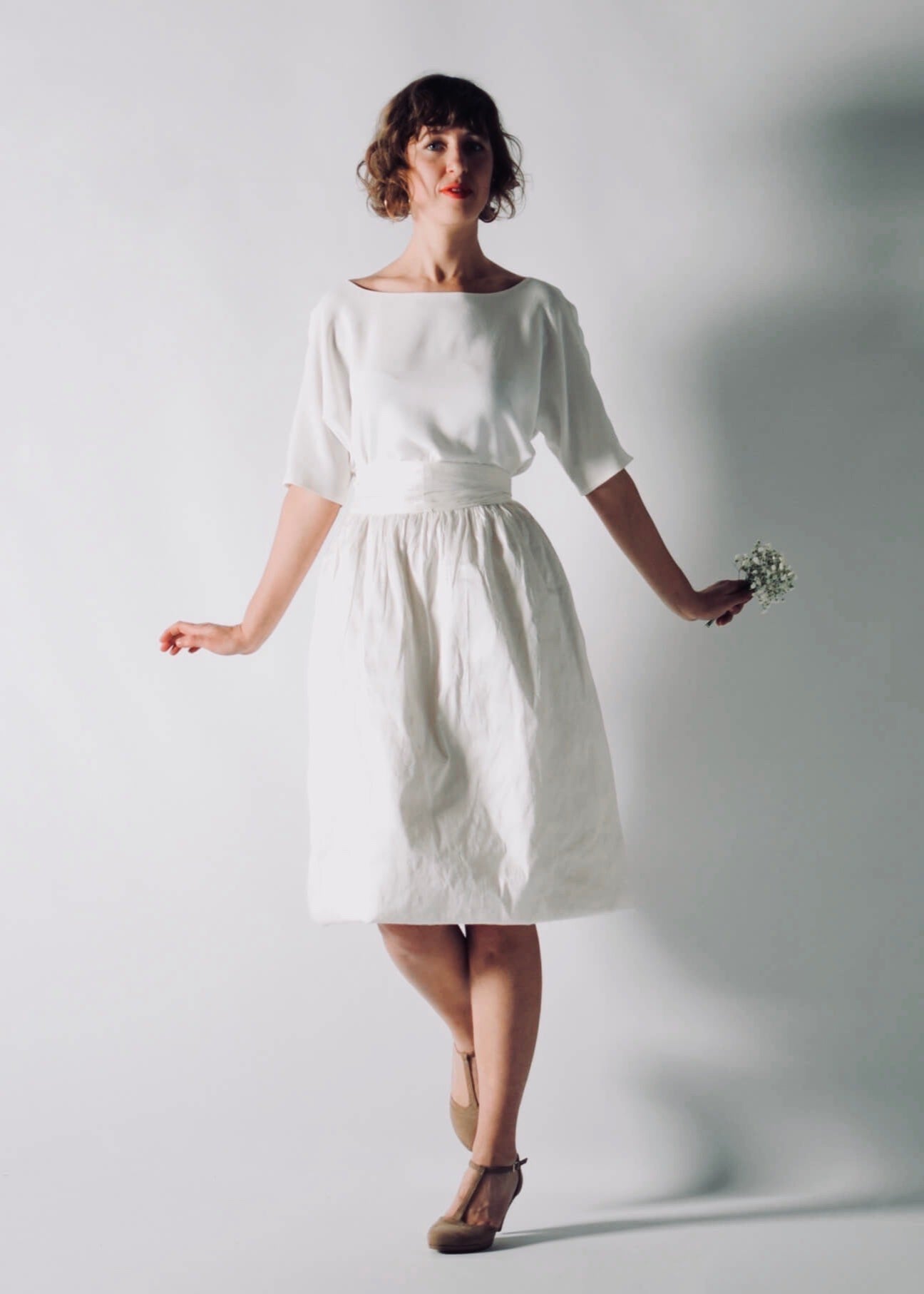 NIGELLA, Playful Short Wedding Dress Separates with Sleeves, movement